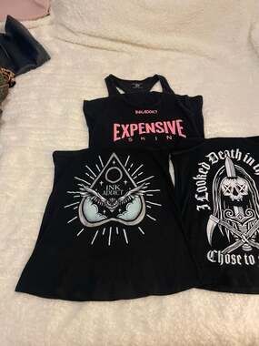 3 InkAddict Tank Tops: Expensive Skin, Ouija Planchette, and Death in the Eyes